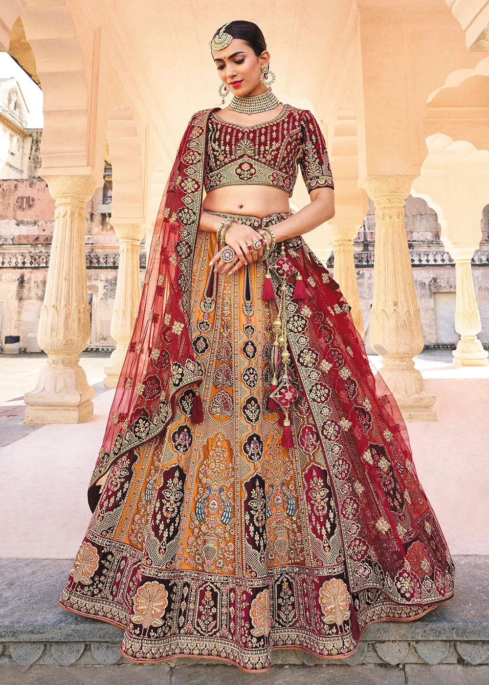 Yellow & Maroon Bridal Wear Heavy Embroidered Silk Lehenga Choli
