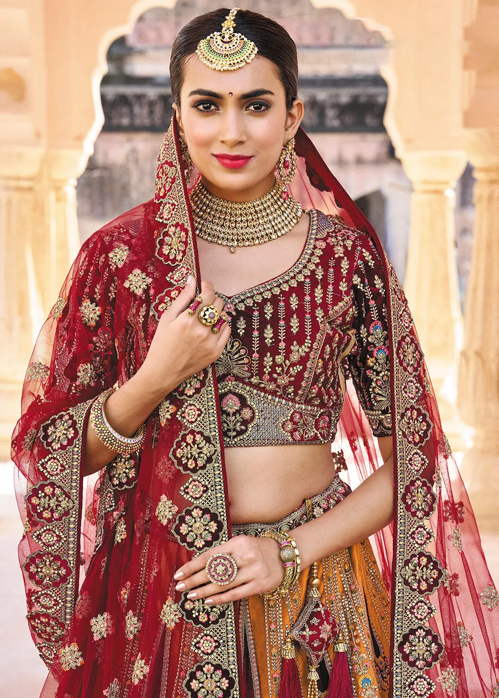 Yellow & Maroon Bridal Wear Heavy Embroidered Silk Lehenga Choli